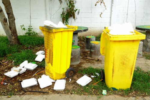 Recycling bins for different types of construction waste